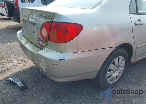 2003 Toyota Corolla Le z USA, uszkodzony, nr VIN JTDBR32EX30015439